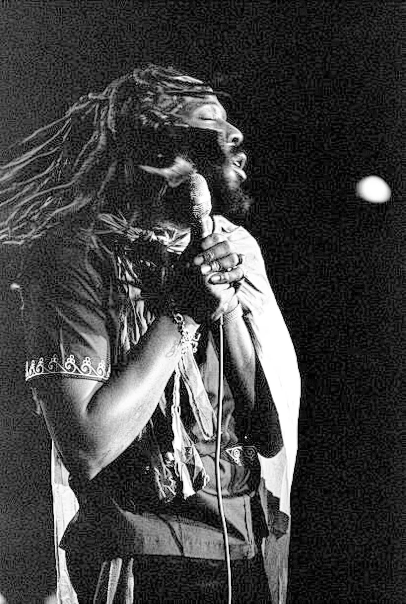 Big Youth on stage, microphone in hand